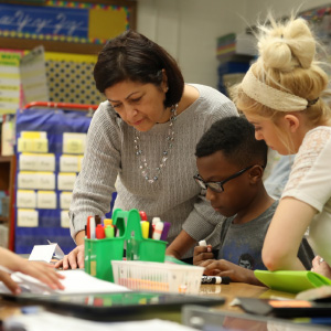 Teachers and Students in a classrooom
