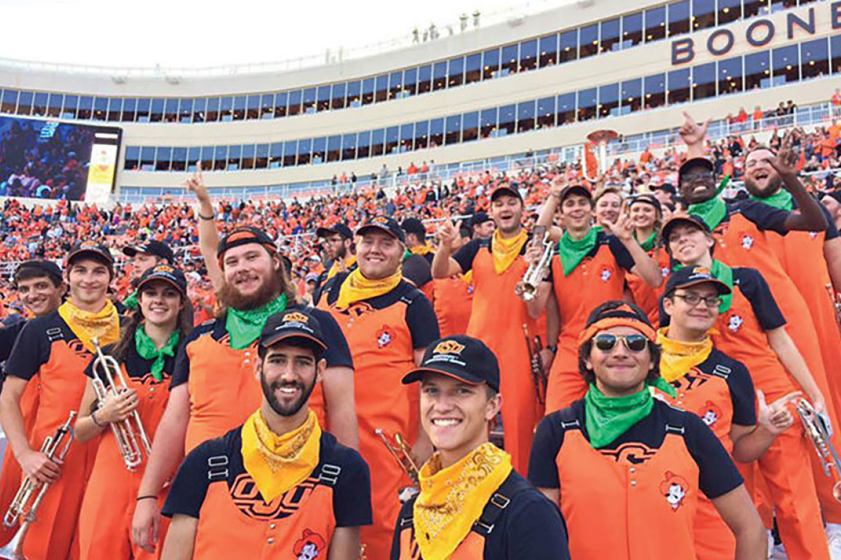 Other bands honored David, including Oklahoma State University’s trumpet section wearing green-and-gold bandanas and playing That Good Old Baylor Line. Photo Courtesy of Oklahoma State University Cowboy Marching Band