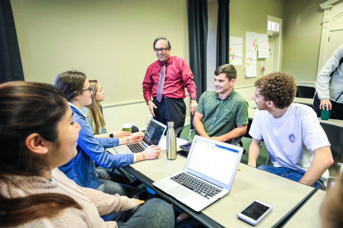 dr._victor_hinojosa_and_students_in_the_social_innovation_lab