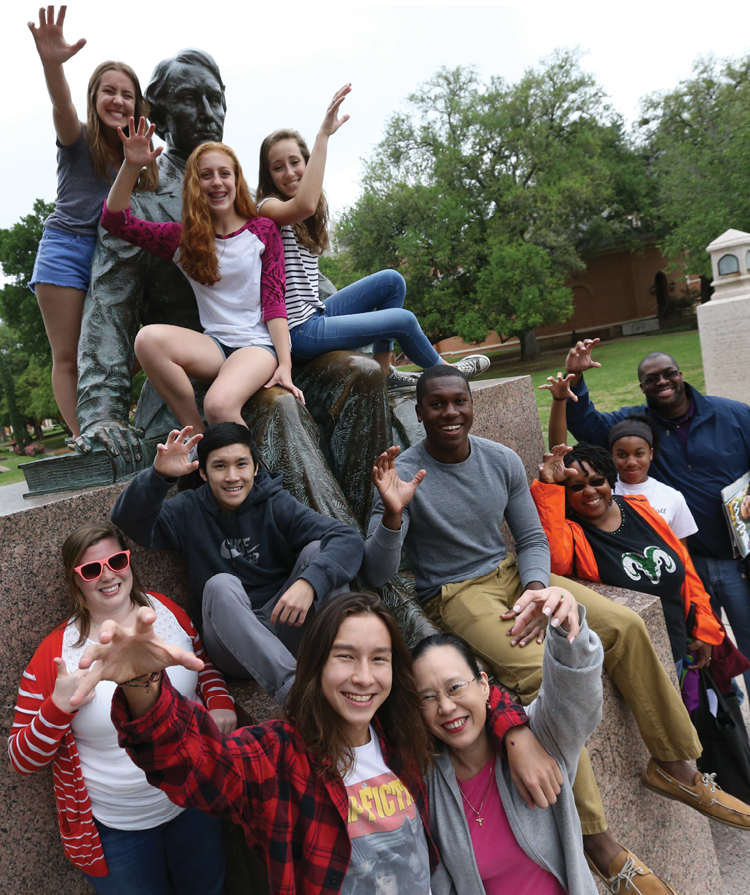 Baylor students on statue of Judge Baylor
