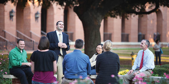 Campus Photo of Professor Holding Class Outside