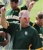Candid Photo of Coach Steve Smith Raising His Cap at a Baseball Game