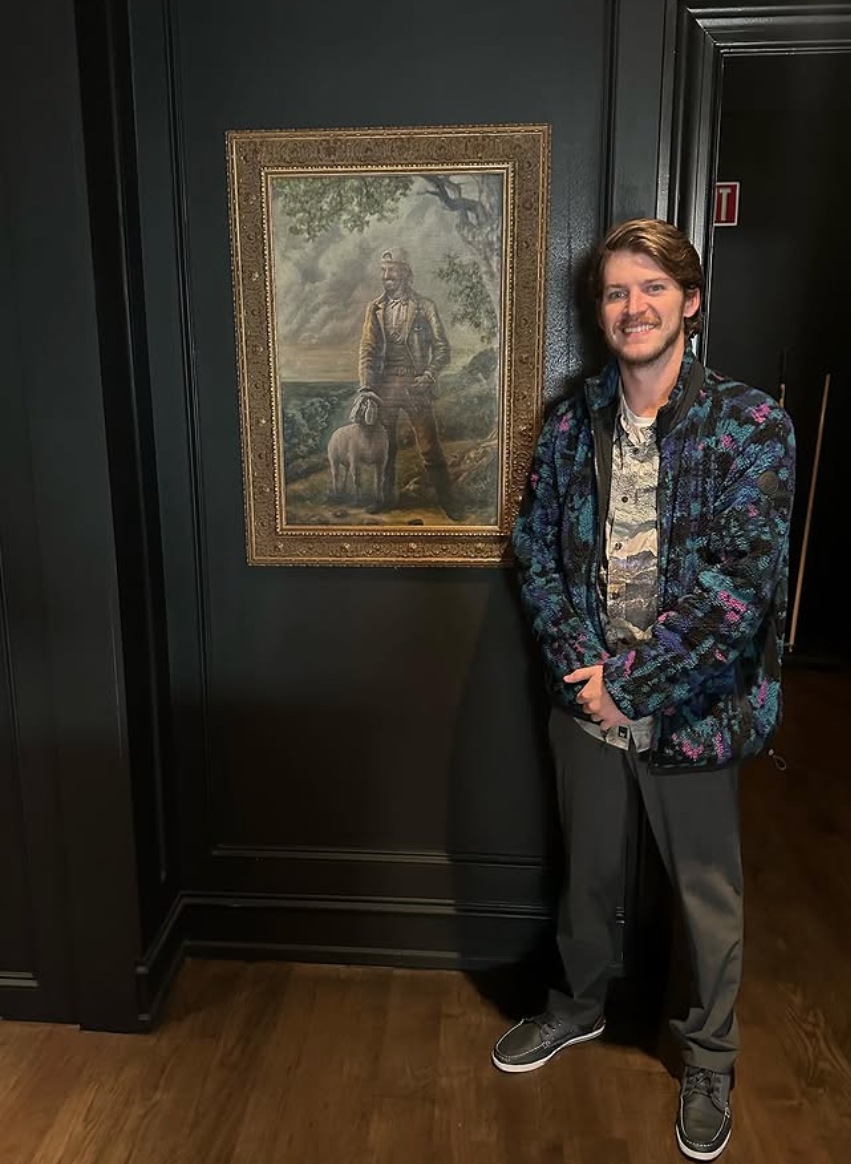 Portrait of Chip Gaines upcycled painting by Cade Kegerreis shown in Hotel 1928 in Waco
