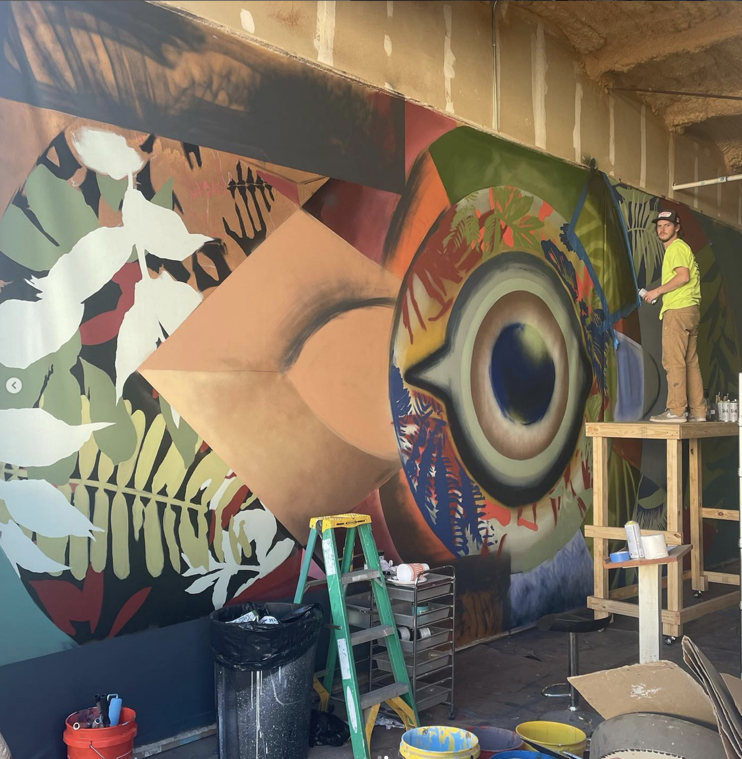 Abstract large format mural in progress by artist Cade Kegerreis