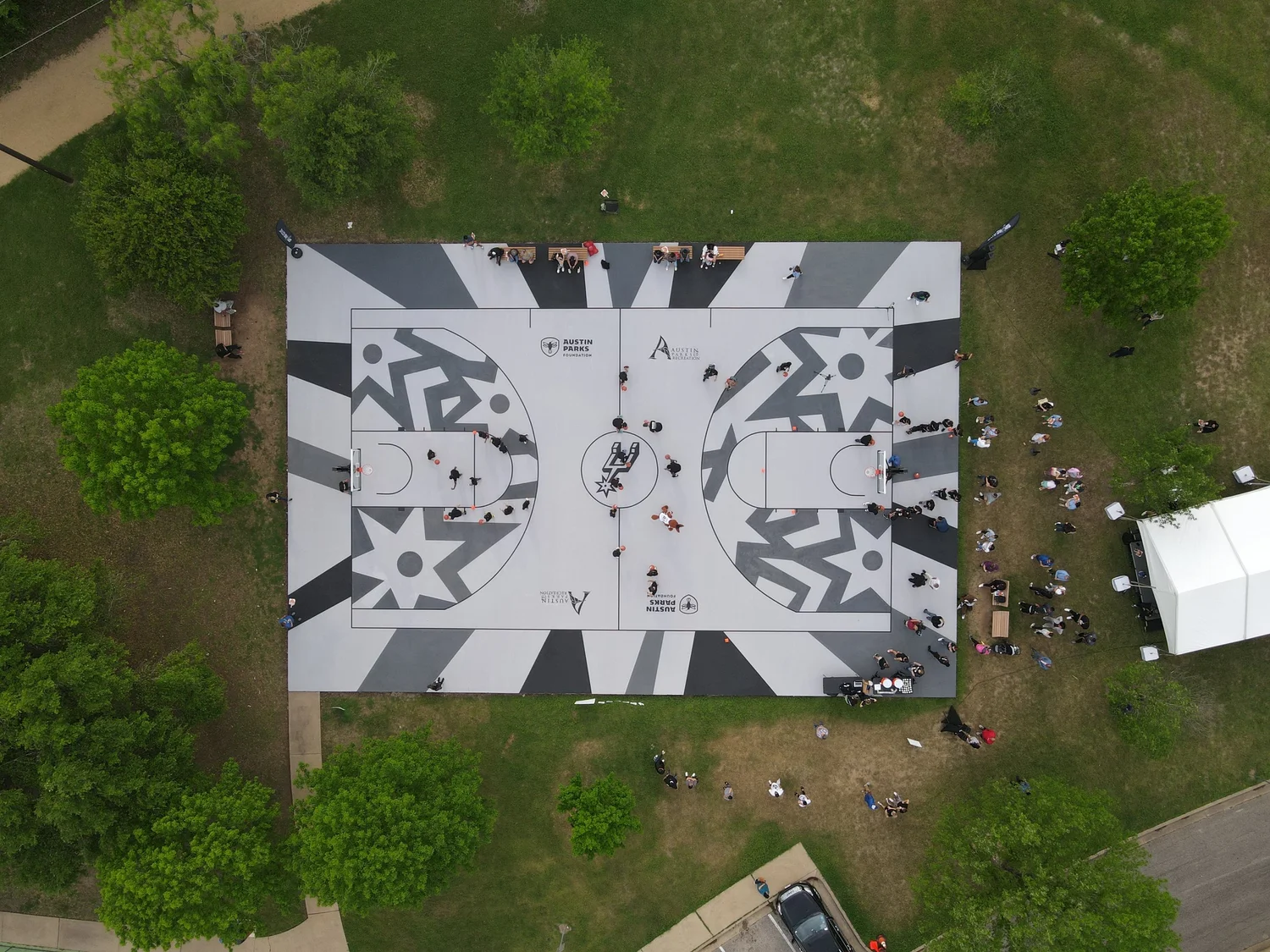 Black and silver abstract basketball court designed by artist Cade Kegerreis
