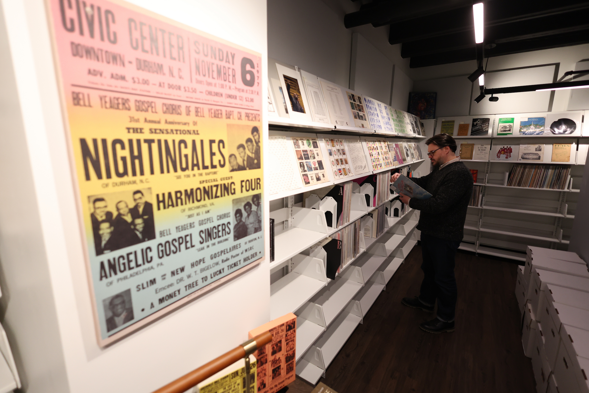 A visitor peruses music in the Black Gospel Music Preservation Program listening room.