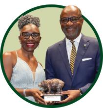 Michael Heiskell (R) receiving award presented by Baylor Black Alumni Alliance President, Marie Brown, B.A. ’92 (L).