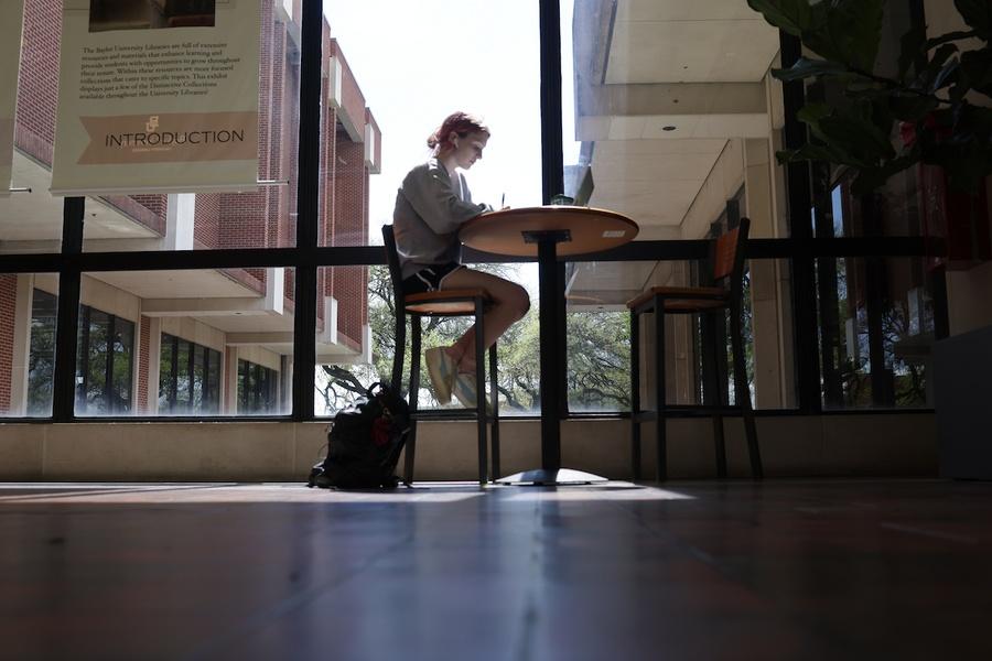A single student studying alone in Moody
