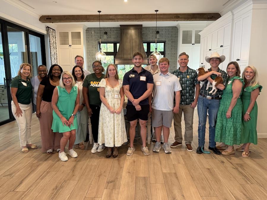 Incoming Baylor families in South Florida pose at a Send-off Party